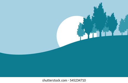 Silhouette of tree on hill