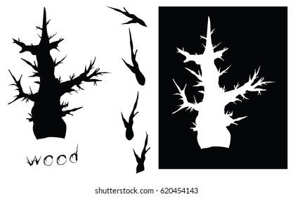 Silhouette of a tree, a stencil and some branches for brushes. Inscription was made by branch brush