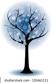 silhouette of a tree in winter snow flakes