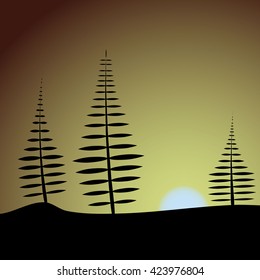 silhouette of trees against a background of dawn