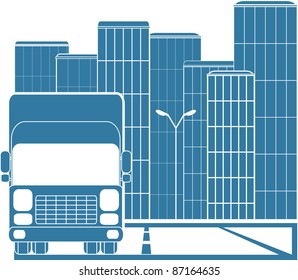 silhouette of truck on background of modern city