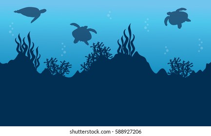 Silhouette of turtle and beauty reef landscape