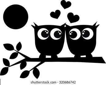 silhouette of two black owls in love