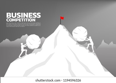 Silhouette of two businessman pushing the big rock to the top of mountain from opposite site. concept of business challenge and hard work.