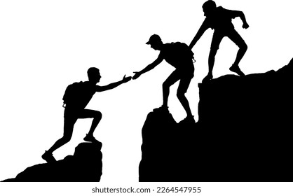 The silhouette of two climbers in the mountains helps another climber overcome an obstacle. Business concept of teamwork and mutual assistance - Shutterstock ID 2264547955
