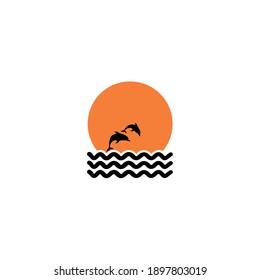 Silhouette of two dolphins jumping out of water in the ocean.