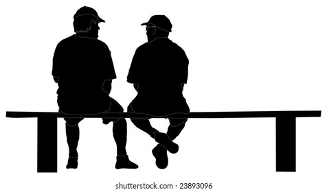 Silhouette of two guys sitting on a bench talking