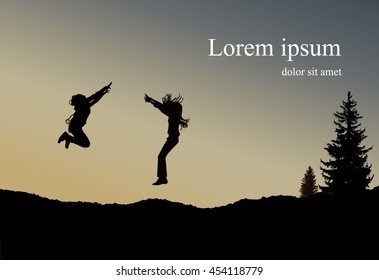 Silhouette of two  jumping girls with long hair on the wilderness. Sunset.