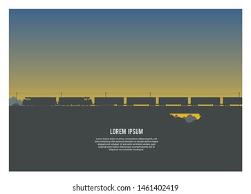 silhouette of two locomotives hauling container train