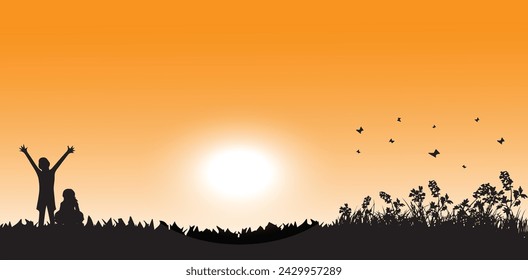 the silhouette of two small children happily welcoming the morning sun with a beautiful orange sky