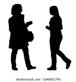 Silhouette. Two women go. Traveler, businessman, tourist. Black and white. Isolated Vector Illustration