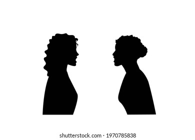 Silhouette Of Two Women. They Are Angry And Shouting Face To Face