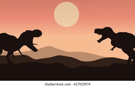 Silhouette of tyrannosaurus with sun at the morning