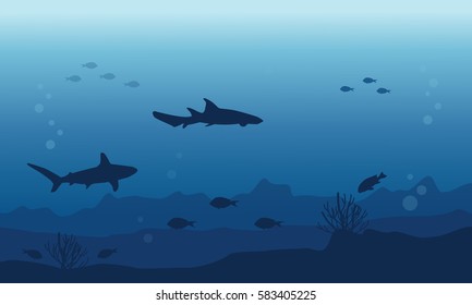 Silhouette of underwater with fish various landscape