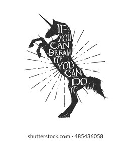 Silhouette of a unicorn with inscription lettering - If you can dream it, you can do it. Isolated on white background