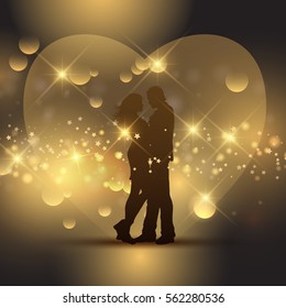 Silhouette of a Valentine's couple in front of a gold heart