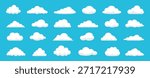 Silhouette of various white cloud shapes on a blue background