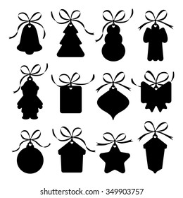 Silhouette vector set of christmas tags isolated on white.