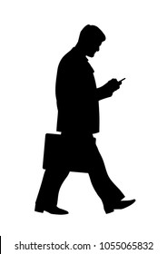 Silhouette Of Walking Businessman. Full Length Side View Of A Young Business Man With A Suitcase, Looking At Smartphone. Office Worker  Moving Forward And Holding A Mobile Phone. Vector Illustration.