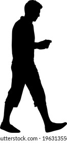 Silhouette of a walking man on a white background.