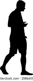 Silhouette of a walking man on a white background.