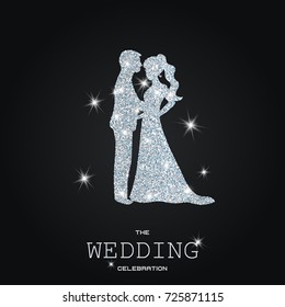 Silhouette of wedding couple with dust glitters. Black background.