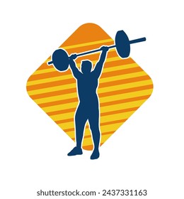 Silhouette of a weight lifting male athlete in action pose. Silhouette of a male athlete in weight lifting sport.