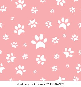 Silhouette white color cat footprints on pink color background. Vector seamless pattern. Repeatable wallpaper.