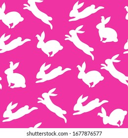 Silhouette of a white rabbits seamless patter on a pink background. Happy Easter concept