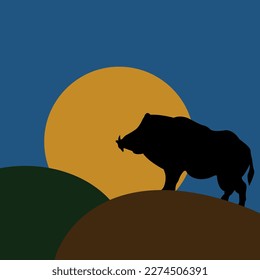 The silhouette of a wild boar. A simple silhouette of a wild pig against the background of the sun.