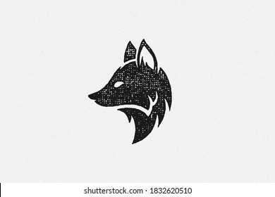Silhouette of wild fox head profile as symbol of wildlife in countryside hand drawn stamp effect vector illustration. Vintage grunge texture on old paper for poster or label decoration.