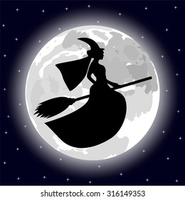 silhouette of a witch on a background of the full moon