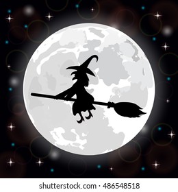 Silhouette of a witch on a background of the full moon