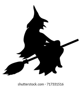 silhouette of a witch on a broomstick on Halloween