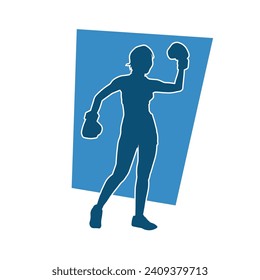 Silhouette of woman boxing athlete in action pose. Silhouette of a female wearing boxing gloves for boxing sport.