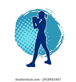 Silhouette of woman boxing athlete in action pose. Silhouette of a female wearing boxing gloves for boxing sport.