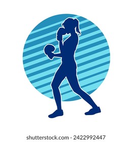 Silhouette of woman boxing athlete in action pose. Silhouette of a female wearing boxing gloves for boxing sport.