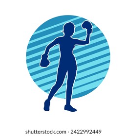 Silhouette of woman boxing athlete in action pose. Silhouette of a female wearing boxing gloves for boxing sport.