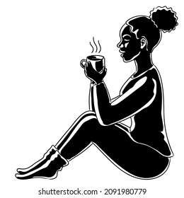 Silhouette of a woman with a cup