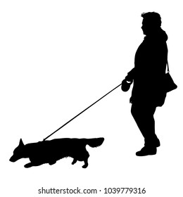 Silhouette of woman and dog on a white background.