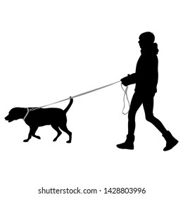 Silhouette of woman and dog on a white background
