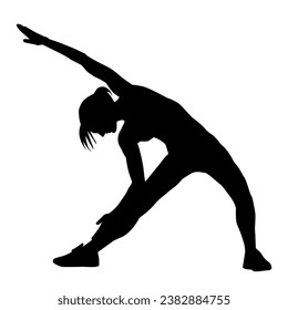 Silhouette of a woman doing aerobic move. Silhouette of a gym sporty person doing warming up workout.