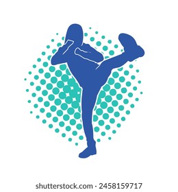 Silhouette of a woman doing a martial art kick. Silhouette of a sporty female doing kicking movement.