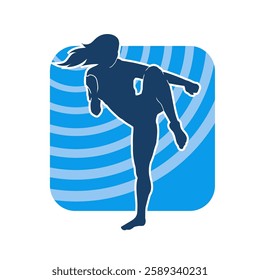 Silhouette of a woman doing a martial art kick. Silhouette of a sporty female doing kicking movement.