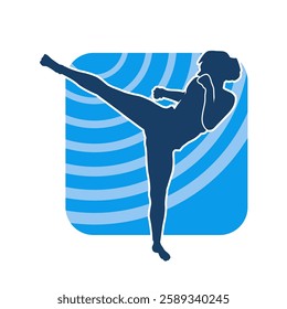 Silhouette of a woman doing a martial art kick. Silhouette of a sporty female doing kicking movement.