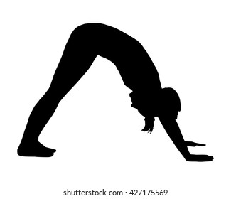 Silhouette of woman doing yoga