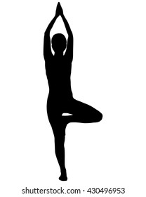 Silhouette of woman doing yoga