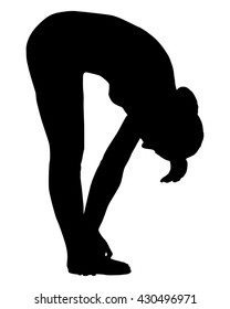 Silhouette of woman doing yoga