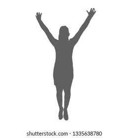 The silhouette of a woman with her hands up, in a suit, shoes and long hair. Happy girl.