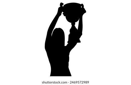 silhouette of woman holding golden trophy